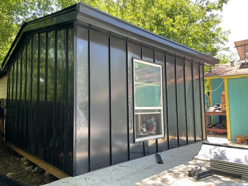 Black standing seam metal wall panels for Metal Roof Installation in Ontwa