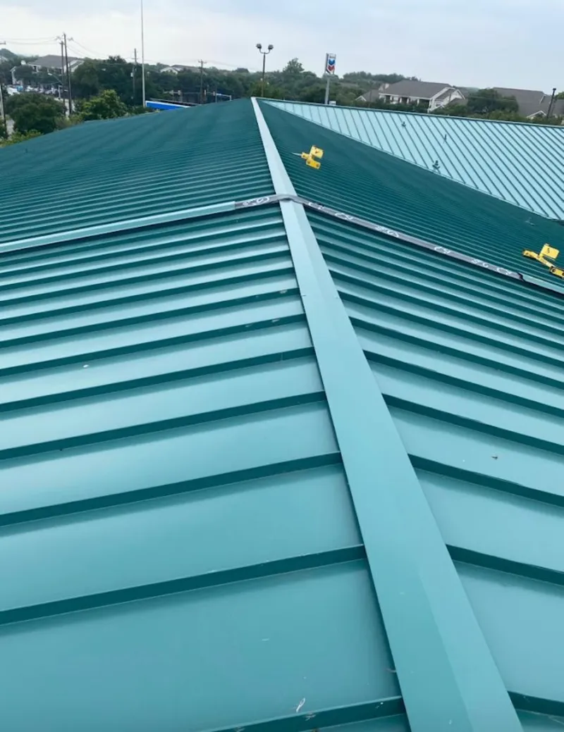 Green commercial metal roof ridge and valley for Metal Roof Repair in Ontwa